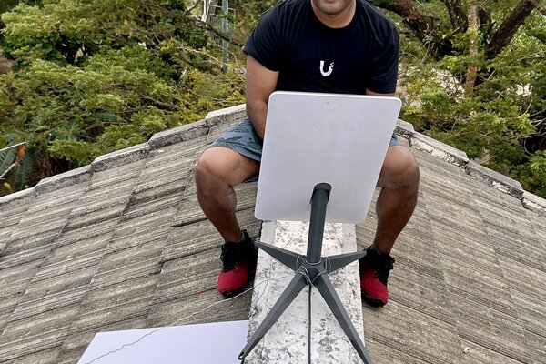 Setting up Starlink on the roof in Chuuck